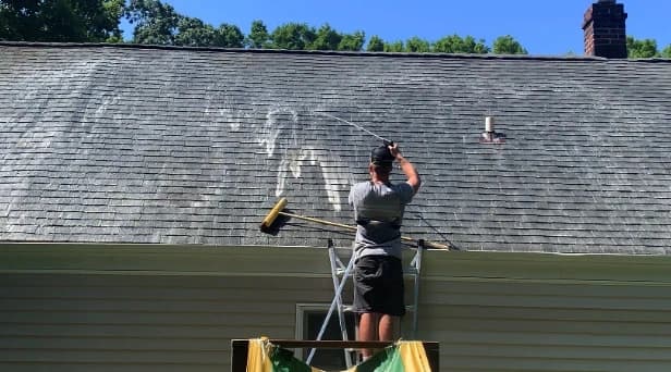 Before and after results of roof washing by Rocky River Power Washing in Rocky River